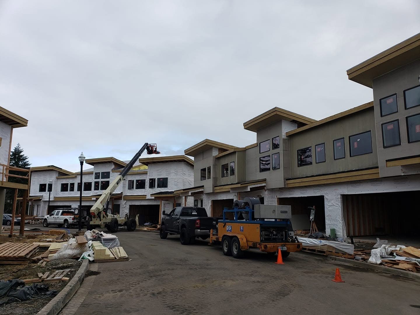 Structural Artiste on a multi-unit construction site — licensed, bonded, and insured